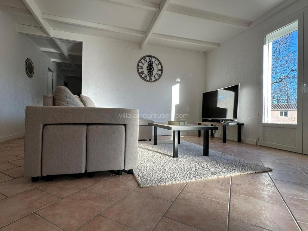 Photo de Villa maison individuelle avec jardin arboré